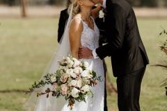 Walla Walla Farm Wedding Jess & Shanon - Wedding ceremony kiss photos