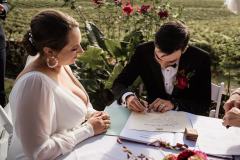 Kiera & Jared Feathertop Winery Wedding - Signing of marriage certificate