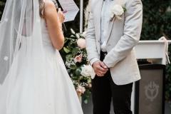 Mel & Jake Radcliffe's Wedding Echuca - Saying of wedding vows photos
